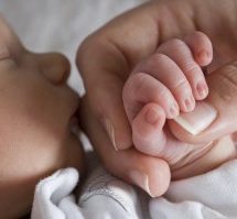 photo-baby-close-up-adult-handiStock_000005013797Medium-300x199.jpg